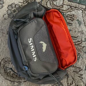 Simms Black and Orange Fly Fishing Pack